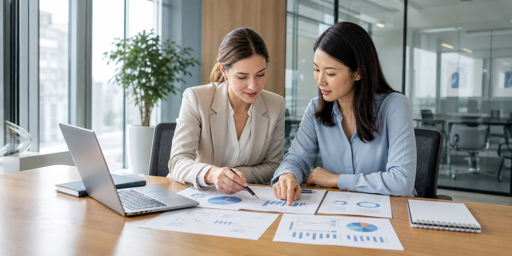 Professionals reviewing global workforce reporting materials
